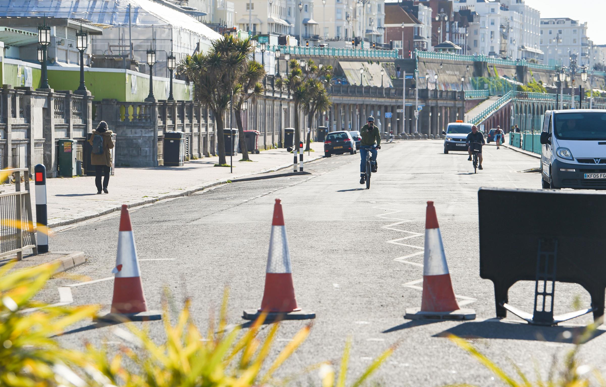 Brighton UK 20th April 2020 - Madeira Drive on Brighton seafront has been closed by the city council to traffic between 8am and 8pm for the next three weeks to allow cyclists and pedestrians to exercise in safer conditions during the Coronavirus COVID-19