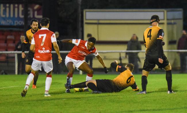 Ronnie Sobowale tries to find a way through for Whitehawk in their FA Trophy defeat to Cray Wanderers. Picture by Andy Schofield