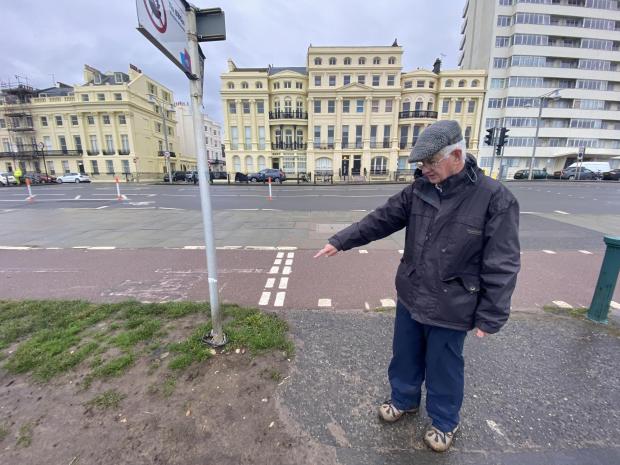 The Argus: Cllr Peltzer Dunn points to where the sign used to be 