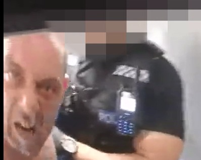 Shocking footage showed the moment Paul Kennard spat at police and swore at them while under arrest in Peacehaven
