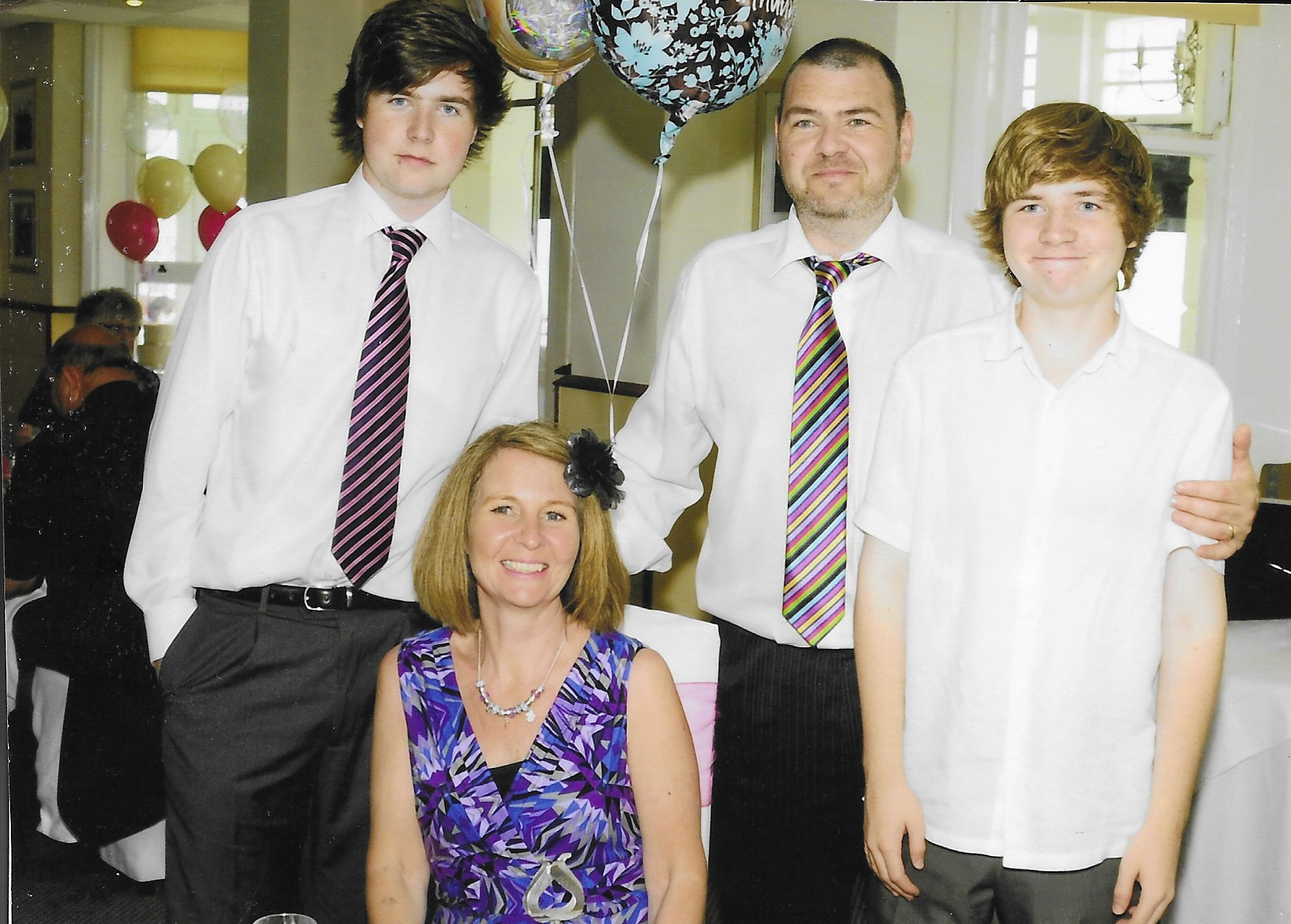 Ryan with brother Tom, mother Rachel and father Scott