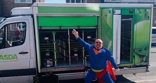 Asda home shopping driver Ian Williams has been delivering dressed as Superman