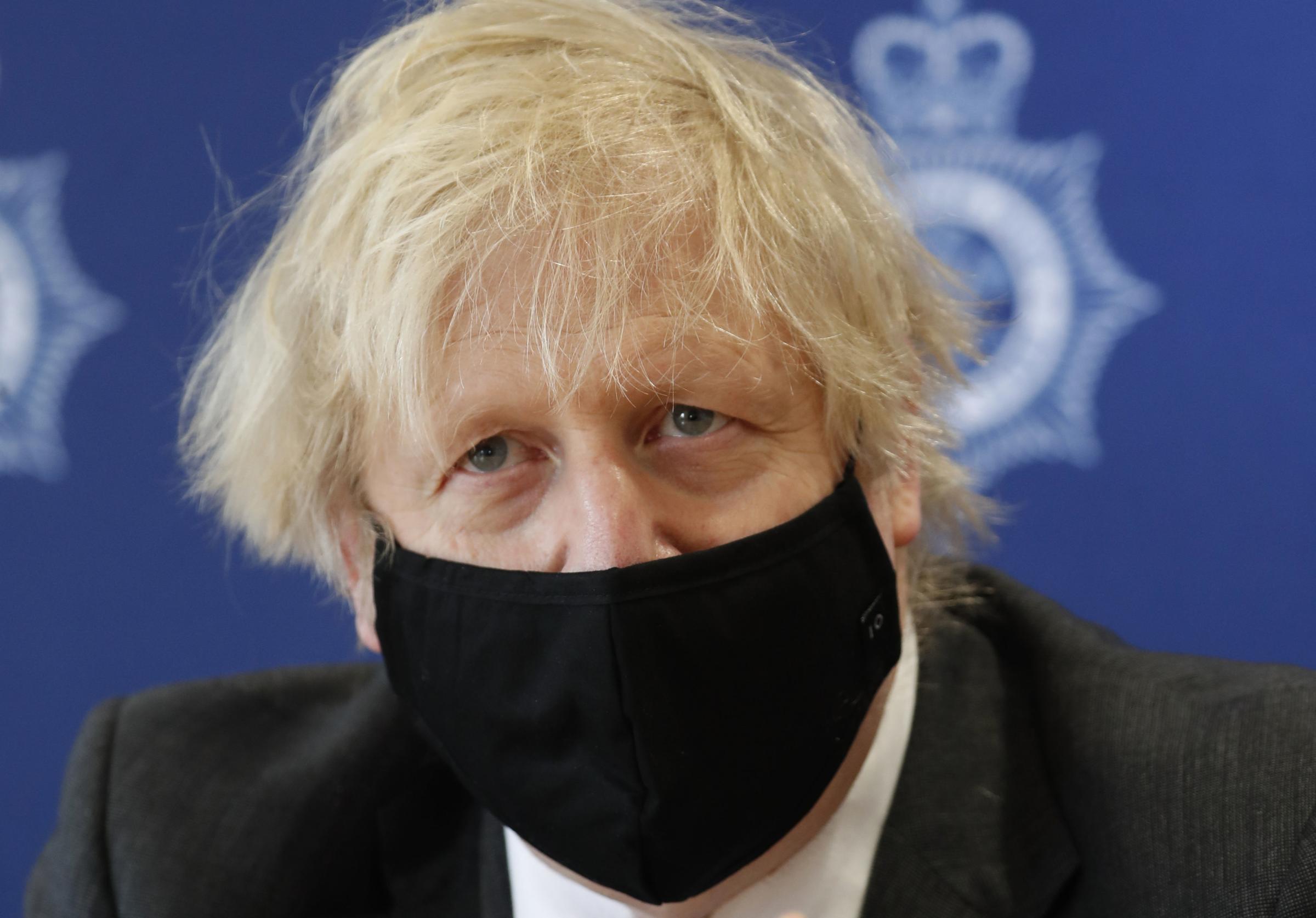 Prime minister Boris Johnson during a visit to South Wales Police Headquarters in Bridgend. Picture date: Wednesday February 17, 2021. PA Photo. See PA story HEALTH Coronavirus. Photo credit should read: Alastair Grant/PA Wire.