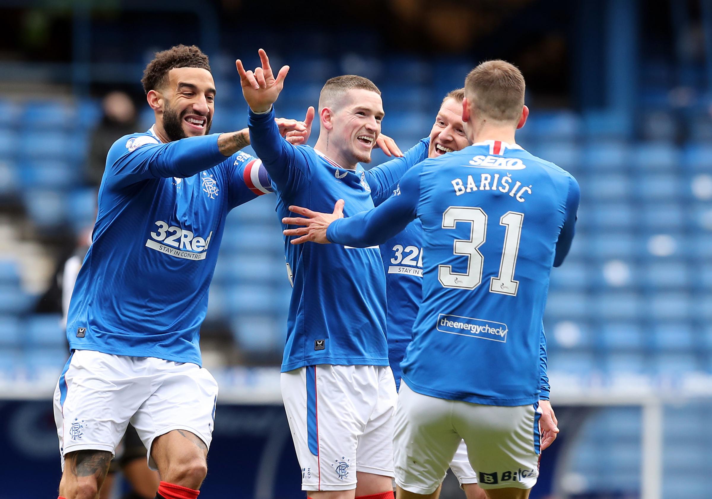 Connor Goldson and Leon Balogun help Rangers win title