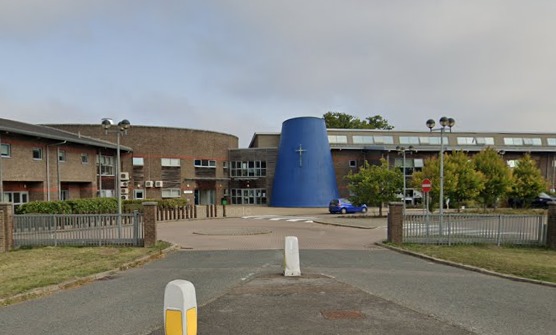 A burglar was seen on CCTV breaking in to St Pauls Catholic College in Burgess Hill and stealing cash