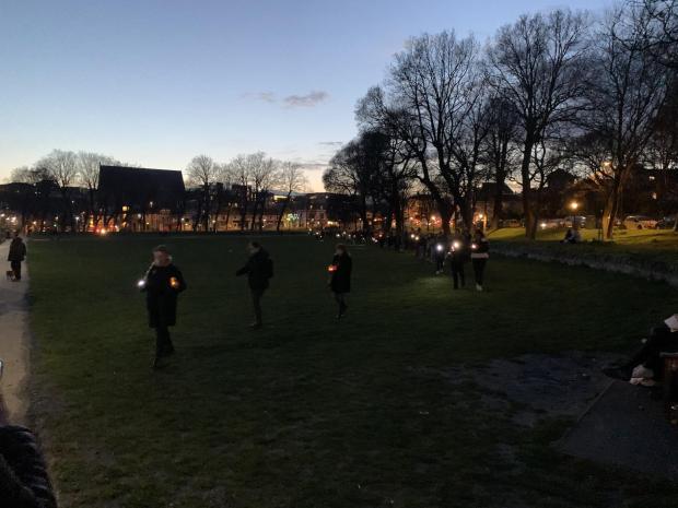 The Argus: Candles and torches lit up the park 