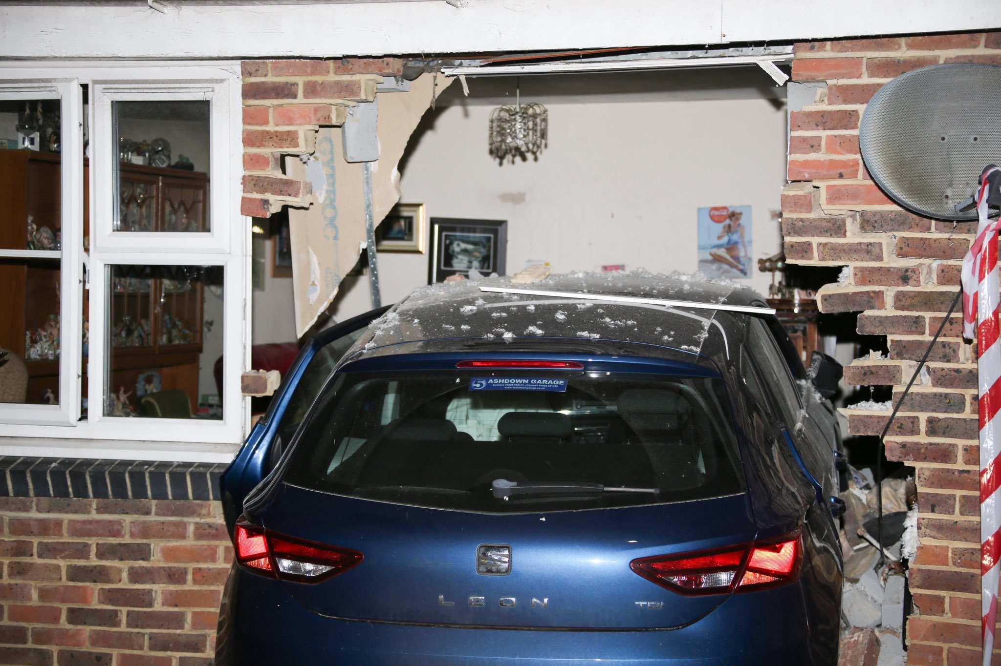 Car smashes into house in Burgess Hill 