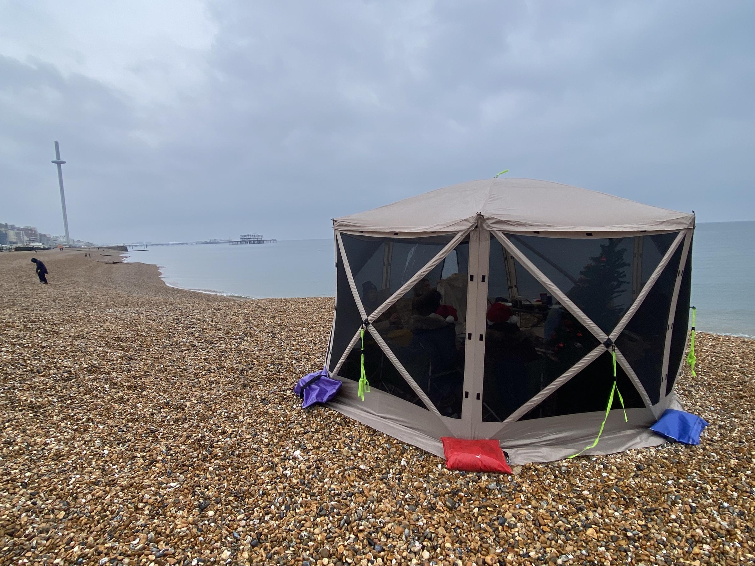 Alex Taylor and John Sharman were joined by four other family members in a tent on Brighton beach