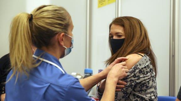 Worrying side effect of Pfizer and Moderna vaccines added to official list. (PA)