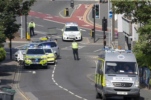 Police car crcsah in Bear Road, Brighton
