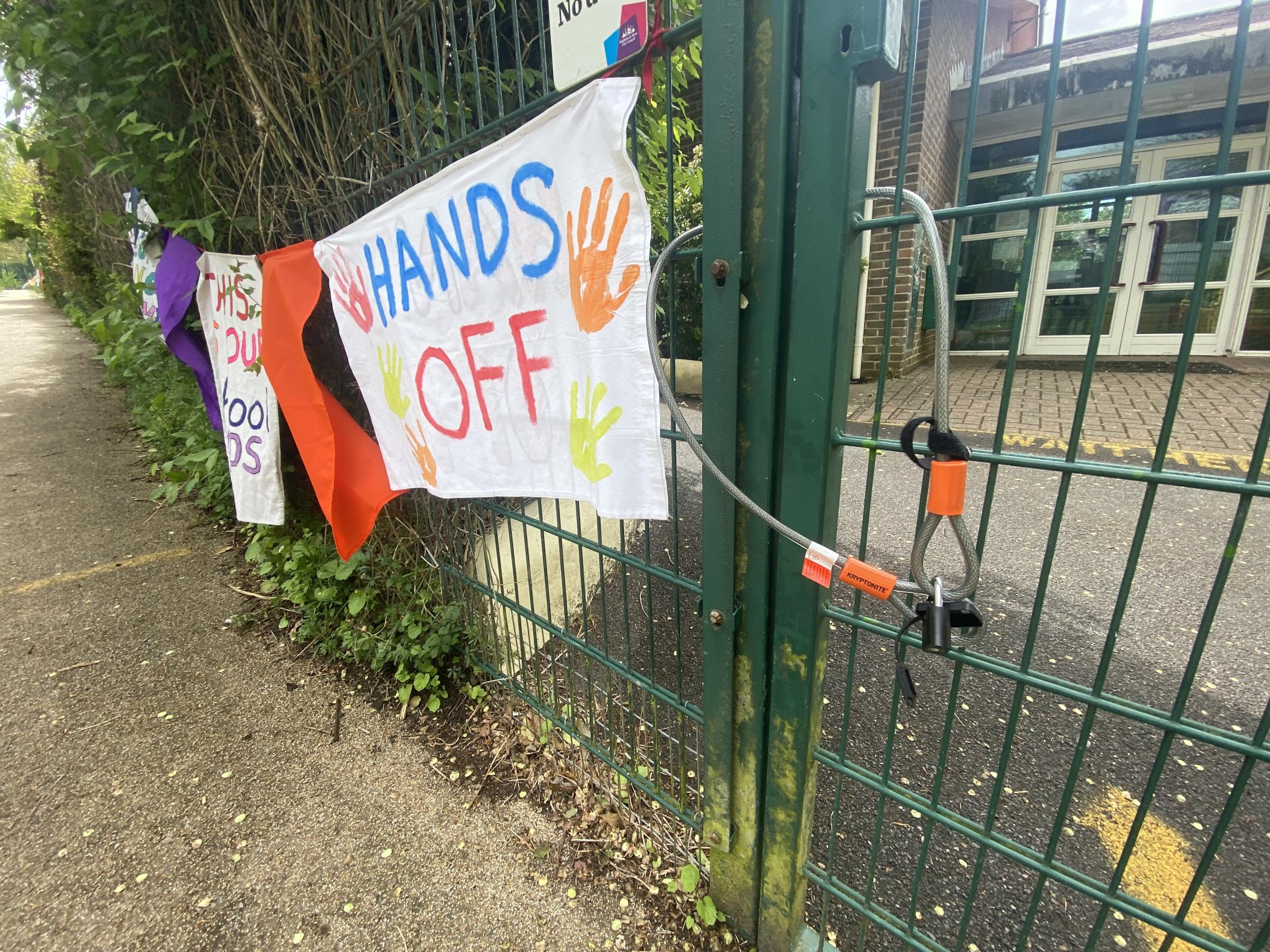 Parents and campaigners block the gates of Moulsecoomb Primary School