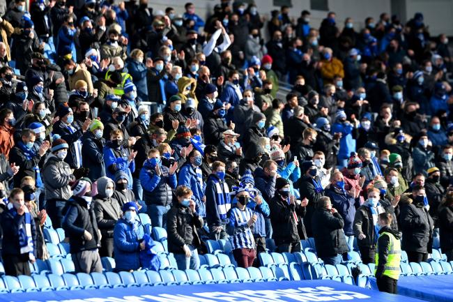 Brighton and Hove Albion fans applaud as the players make their way out onto the pitch prior to the beginning of the Premier League match at the AMEX Stadium, Brighton. PA Photo. Picture date: Sunday December 20, 2020. See PA story SOCCER Brighton. Photo