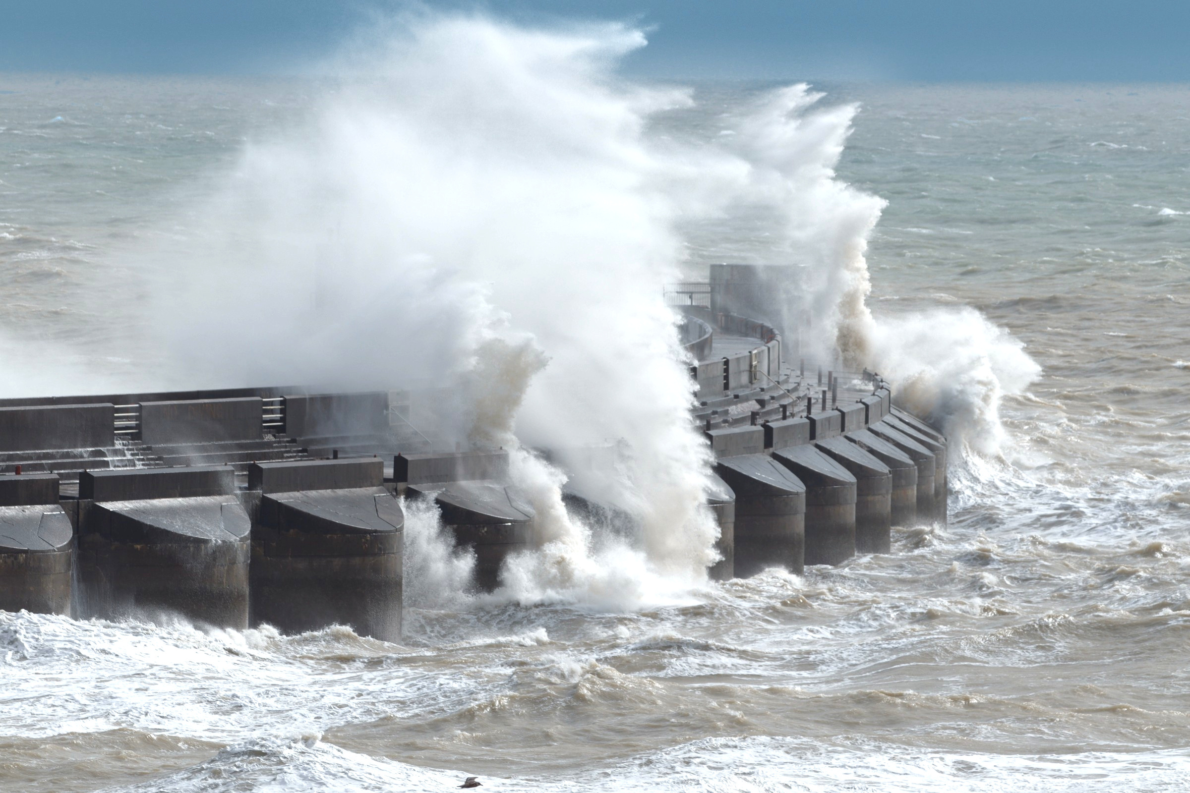Breaking waves at Brighton Marina