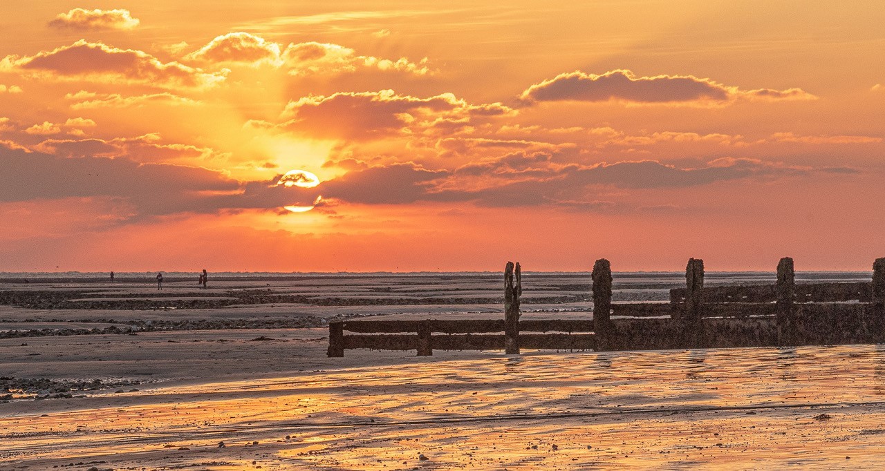 Jan Budgen loves sunrises and sunsets. This is sunset from Goring beach. Right, a rare picture of Jan herself