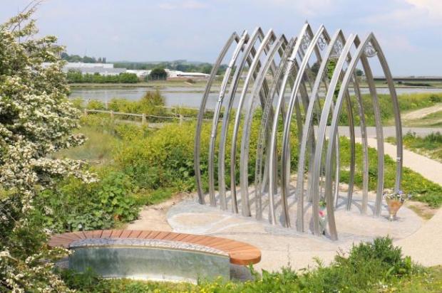 The Argus: A memorial bench and 11 individually crafted arches sit alongside the River Adur to remember those who lost their lives in the Shoreham Airshow Disaster