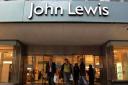 John Lewis warns of more shop closures after first ever annual loss