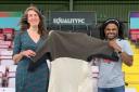 Artist Barbara Keal (left) and Lewes FC midfielder Bradley Pritchard (right) holding the as yet unpatched Coat of Hopes