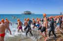 Hundreds of people took the plunge and swam the kilometre-long route from the West Pier to the Palace Pier along Brighton seafront