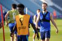 Bukayo Saka and Jordan Henderson during a training session before England's World Cup clash with Wales