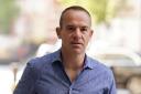 Money advice services should be located on the same site as NHS talking therapies services, Martin Lewis said