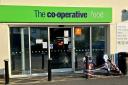 A shop worker had to go to hospital with serious head injuries following an assault in a Co-op in Portslade