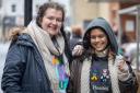 Friends Holly Pethybridge and Fahima Begum, holding a hand warmer, at the queue,