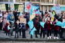 Parents protested outside Hove Town Hall over the plans to close schools in Brighton