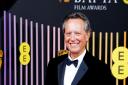 Richard E. Grant attends the Bafta Film Awards 2024, at the Royal Festival Hall, Southbank Centre, London (Ian West/PA)