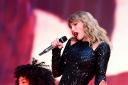 Taylor Swift performs on stage (Ian West/PA)