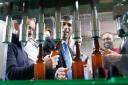Prime Minister Rishi Sunak watching beer being bottled at the Vale of Glamorgan Brewery (Stefan Rousseau/PA)
