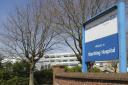 A junior doctor performed private cosmetic surgery while on sick leave from Worthing Hospital