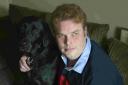 Daniel Walker, with his dog Pebble, was told he was overqualified for an unpaid work placement