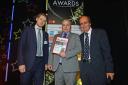 PC Dave Catt is presented with Local Hero of the Year at the Argus Community Stars Awards at the Theatre Royal, Brighton by Jack Englehart, left, and Fred Dinnage.