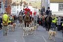 Hundreds of people line the streets to see the Southdown and Eridge Foxhounds take part in their traditional Boxing Day hunt in Lewes.  Picure: Simon Dack
