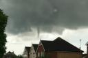 The tornado that hit Worthing and Lancing capture in this picture taken from Upper Beeding.  Picture: Michael Cracknell