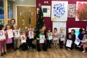 The children spell out their success