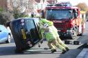 The overturned car in St Lawrence Avenue, Worthing