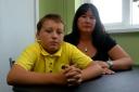 Zak Burley, 12, with his mother Stefanie