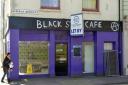 Squatters behind cafe plan evicted