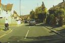 VIDEO: Scooter rider caught on camera on the pavement and narrowly avoiding crash