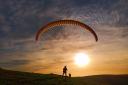 A paraglider preparing to take off from Devil's Dyke