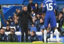 Roberto De Zerbi watches his side at Chelsea