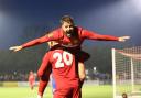 Ollie Pearce gets a lift as he scores a Worthing hat-trick