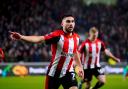 Neal Maupay celebrates his goal for Brentord against Luton