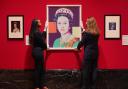Andy Warhol’s Reigning Queens (Royal Edition): Queen Elizabeth II of the United Kingdom, 1985, during the preview for Royal Portraits exhibition (Yui Mok/PA)