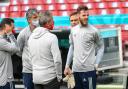 David De Gea in discomfort and surrounded by medical staff as Spain train at Parken