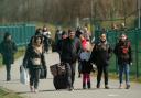 Refugees at the Ukrainian border: credit - PA