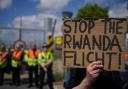 Migrants rights groups hold a show of support for people detained at Brook House Immigration Removal Centre at Gatwick who are scheduled to be sent to Rwanda: credit - PA