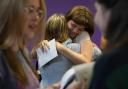 Students congratulate each other receiving their GCSE results at Roedean School
