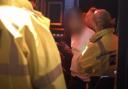 Officers de-arrested the man and took him home after he kicked a waitress at a strip club: credit - Channel 4/Nightcoppers